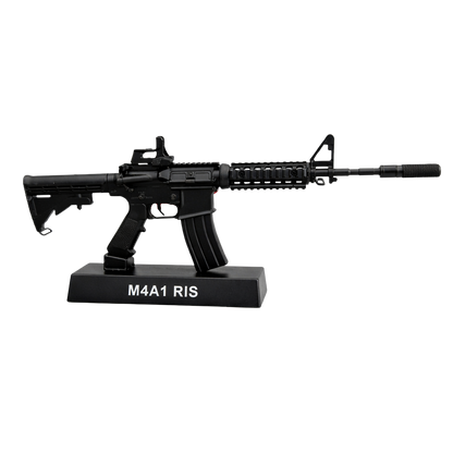 Miniature black metal M4A1 RIS rifle replica on display stand