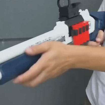 Loads the blue-and-white Atlas, aims, fires, and ejects a red casing.
