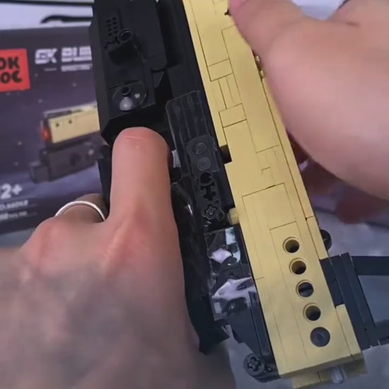 Sandstorm demo: handling the magazine and working the mechanism.